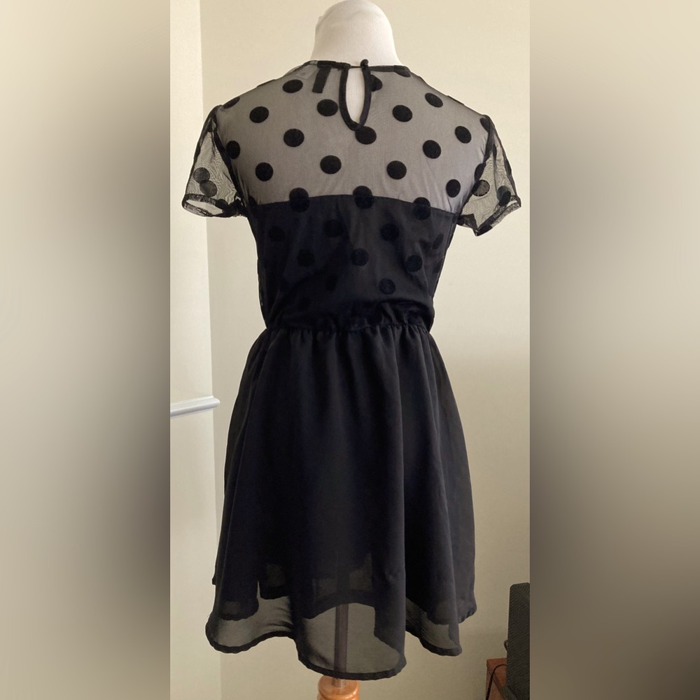 Black Eve Mini Dress.         -